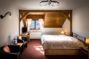 Postel nebo postele na pokoji v ubytování Holzberg
