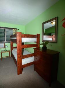 Postel nebo postele na pokoji v ubytování Kalani Hawaii Private Lodging