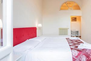 Voodi või voodid majutusasutuse Hotel St. James toas