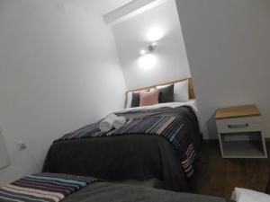 Voodi või voodid majutusasutuse Vila Vrh toas
