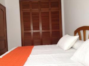 Postel nebo postele na pokoji v ubytování Apartamentos Brisamar a 50 metros de la playa