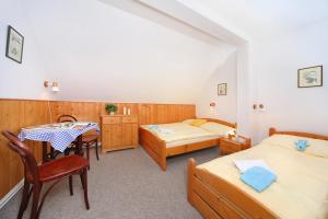 Posteľ alebo postele v izbe v ubytovaní Chalupa Na Desítce