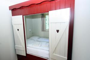Postel nebo postele na pokoji v ubytování Park Nieuwgrapendaal