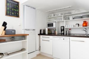 Virtuvė arba virtuvėlė apgyvendinimo įstaigoje Apartment DROYSEN Kurfürstendamm - Cozy Family & Business Flair welcomes you - Rockchair Apartments