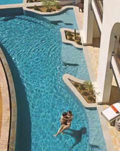 Bazén v ubytování Secrets Puerto Los Cabos Golf & Spa18+ nebo v jeho okolí