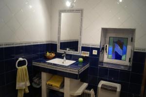 Koupelna v ubytování Casa de Corbelle + 48 fotografií