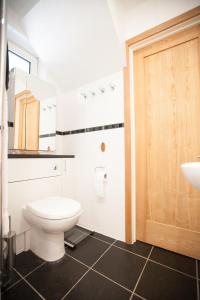 a bathroom with a toilet and a sink at Honest University Apartment 2 in Southampton