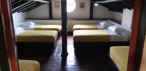Cama o camas de una habitación en Cedron Hostel
