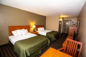 Postel nebo postele na pokoji v ubytování FairBridge Inn & Suites - Lewiston