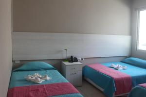 Postel nebo postele na pokoji v ubytování Villa Kite