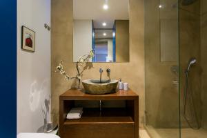 a bathroom with a sink and a shower at Marchesa Da Bica Luxury in Lisbon +42 photos