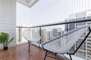 Een balkon of terras bij Haikou Meilan District · Xixili Locals Apartment 00175140