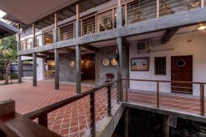 an external view of a building with a balcony at Lanta Harbour in Ko Lanta