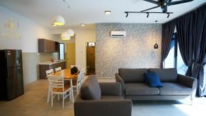 Χώρος καθιστικού στο Atlantis Residence @ Icon Stay Melaka