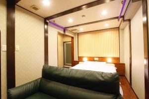 Letto o letti in una camera di Hotel Mio (Adult Only)