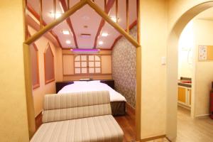 Letto o letti in una camera di Hotel Mio (Adult Only)