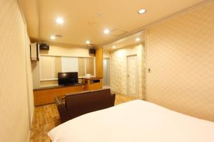 TV o dispositivi per l'intrattenimento presso Hotel Mio (Adult Only)