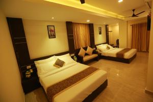 The Crescent Suites客房内的一张或多张床位
