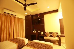 The Crescent Suites客房内的一张或多张床位