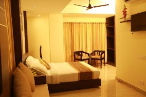 The Crescent Suites客房内的一张或多张床位