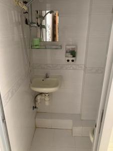 Koupelna v ubytování 嘉應賓館HAKKAS GUEST House