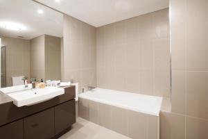 A bathroom at The Junction Palais - Modern and Spacious 2BR Bondi Junction Apartment Close to Everything