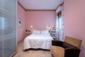 Łóżko lub łóżka w pokoju w obiekcie Downtown Ronda -Parking included-