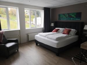 Postel nebo postele na pokoji v ubytování Centrum Hotel