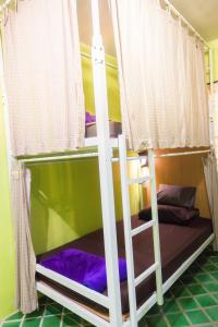 Postel nebo postele na pokoji v ubytování Plus Hostel Ayutthaya