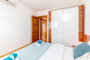 Postel nebo postele na pokoji v ubytování Apartments Lulic