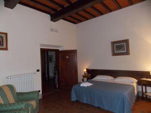 A bed or beds in a room at Il Villino