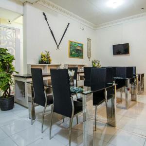 TV a/nebo společenská místnost v ubytování Hotel Alifa Syariah