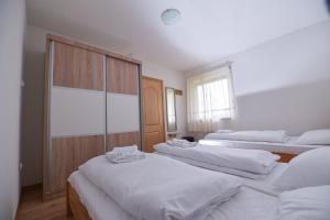 Säng eller sängar i ett rum på Apartments Villa Deja