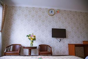 TV a/nebo společenská místnost v ubytování Huynh Duc Hotel