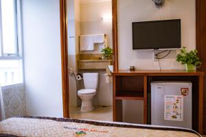 Koupelna v ubytování Huynh Duc Hotel + 37 fotografií