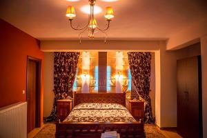 Posteľ alebo postele v izbe v ubytovaní Andromeda Hotel Limni Plastira