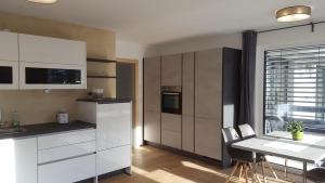 Kuchyňa alebo kuchynka v ubytovaní Alpenappartement Sonne