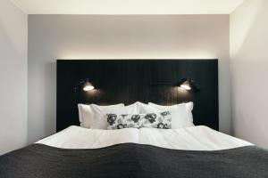 Postelja oz. postelje v sobi nastanitve Apótek Hotel Reykjavík by Keahotels