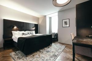 Postelja oz. postelje v sobi nastanitve Apótek Hotel Reykjavík by Keahotels