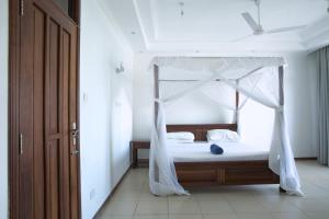 Krevet ili kreveti u jedinici u objektu Almasi Oceanfront Nyali