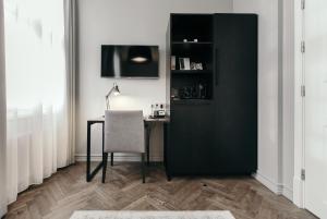 Kuhinja oz. manjša kuhinja v nastanitvi Apótek Hotel Reykjavík by Keahotels