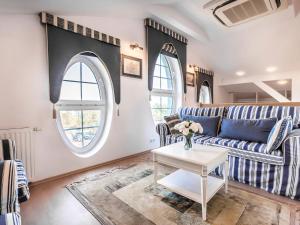 Posezení v ubytování VacationClub - Rezydencja Bursztyn Apartament 36 + 18 fotografií