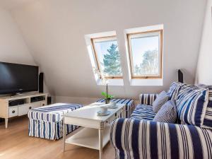 TV a/nebo společenská místnost v ubytování VacationClub - Rezydencja Bursztyn Apartament 36