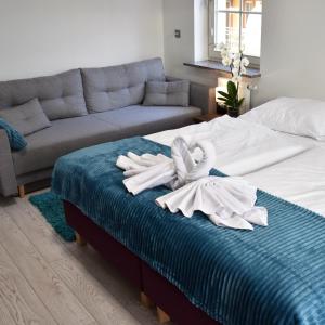 Postel nebo postele na pokoji v ubytování Aparthotel Baltic Spa