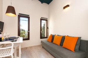 Posezení v ubytování ecoGrusApartments