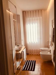 Ванная комната в Giardini Calce - Luxury Rooms