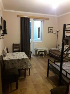 Ένα ή περισσότερα κρεβάτια σε δωμάτιο στο Luxuri Apartment