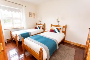 Letto o letti in una camera di Nellie Dee's - Room Only