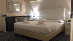 Antico Hotel Moderno客房内的一张或多张床位
