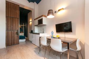 Kuchyň nebo kuchyňský kout v ubytování ecoGrusApartments